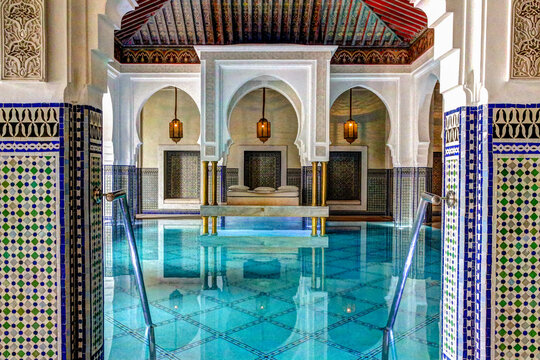 Marrakech, Morocco - April 6, 2019: Pool facility at the luxurious La Mamounia resort in Marrakech, Morocco. 