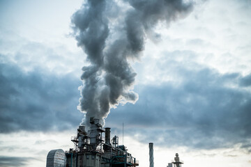 Fototapeta na wymiar smoke coming out of factory chimney industry and global warming