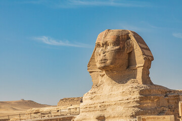Africa, Egypt, Cairo. Giza plateau. Great Sphinx of Giza in front of the Great Pyramid of Giza.