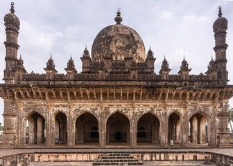 Vijayapura, Karnataka, India - November 8, 2013: West side of brown stone Ibrahim Rauza mausoleum...