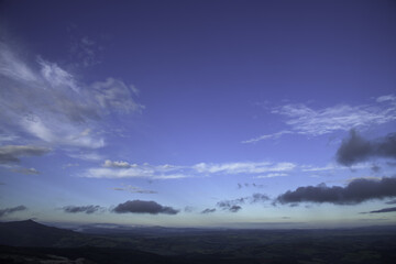 Fototapeta na wymiar time clouds over the mountains