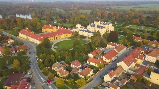 Aerial view of small town Lednice and castle yard with green gardens in Moravia, Czech Republic. UNESCO World Heritage Site.