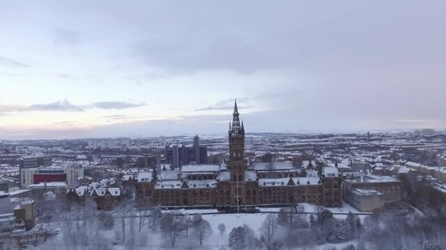 Aerial shot of Glasgow University covered in snow