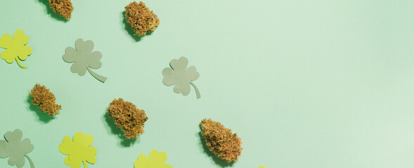 Saint Patrick's Day pattern. Cannabis buds with four leaf clover pattern. Copy space. 
