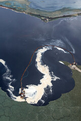 Africa, Kenya, Magadi, Aerial view of barge pumping soda ash from lake floor of Lake Magadi for...
