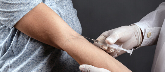 the doctor vaccinates the patient,vaccination against coronavirus