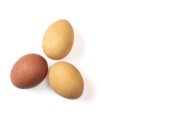 Brown eggs on white background