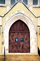 Catholic Church Has Brown Rustic Door