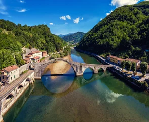 Gordijnen Devil Bridge near to Lucca - Garfagnana - Tuscany Italy © nadirco