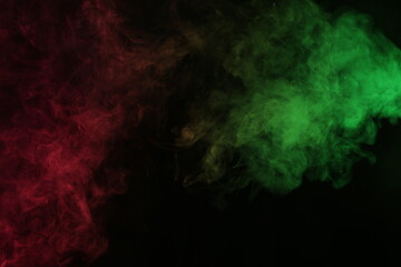 Smoke in red-green light on black background