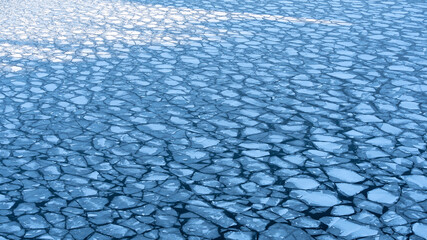 Large chunks of ice blocks forming a beautiful pattern, after the icebreaker ship passed by and crushed the densely packed ice. This is a necessity so that the sea traffic can continue in Stockholm. © Anders