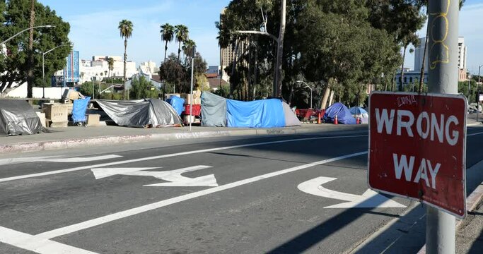 A homeless encampment on a freeway off ramp in Los Angeles