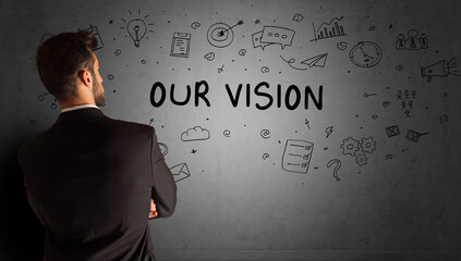 businessman drawing a creative idea sketch with OUR VISION inscription, business strategy concept