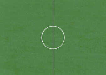Center of a soccer field with white stripes and green grass