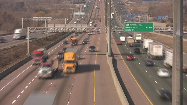 Multi-lane highway time-lapse. Driving on the 401 Highway in Toronto, Ontario, Canada.