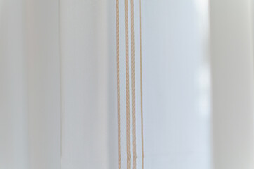 Close-up curtains with blurred background.