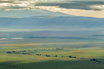 Africa, Tanzania, Ngorongoro Crater. Cloudy landscape inside crater.