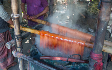 Traditional way of dying yarn in the traditional weaving village, Tangail district, Dhaka Division,...