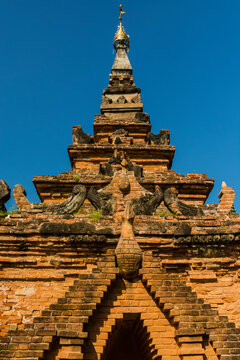 Myanmar. Mandalay. Inwa. Red brick stupa.