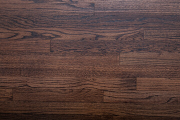 Photograph of hardwood flooring with a walnut stain