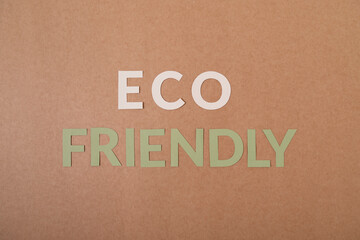 Eco friendly cardboard letters on a craft paper