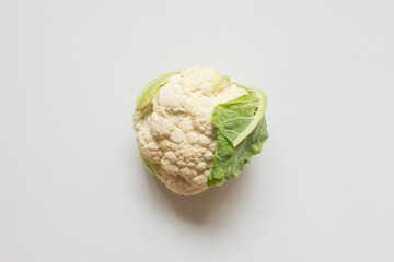 High angle view of organic whole cauliflower on white background