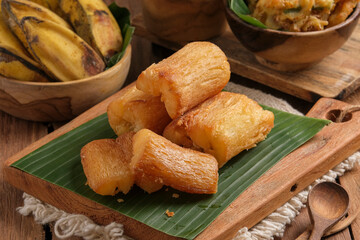 Fried Cassava served on wooden table
