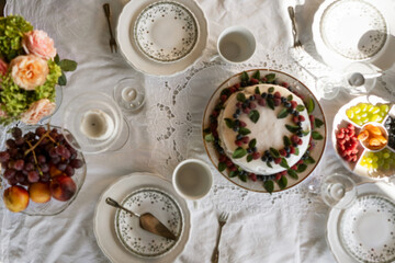 cake on the table on a white tablecloth, top view