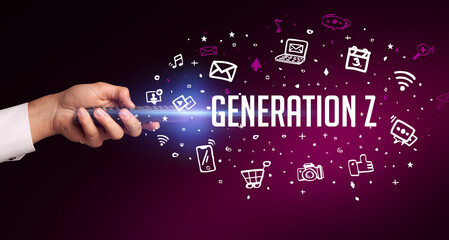 hand holding wireless peripheral with GENERATION Z inscription, social media concept