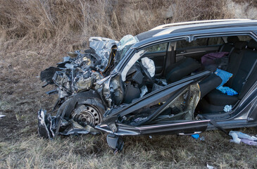 Terrifying deadly car crash accident after a frontal collision. Twisted metal and destruction after...