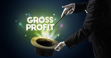 Illusionist is showing magic trick with GROSS PROFIT inscription, new business model concept