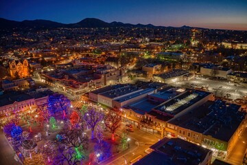 Fototapeta na wymiar Aerial View of Santa Fe, New Mexico at Dusk during Christmas