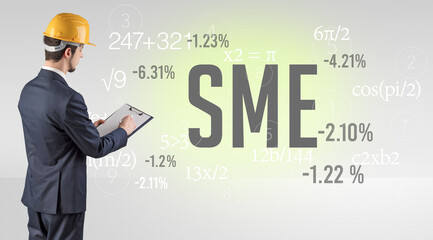 Technology Engineer in hard hat with SME abbreviation