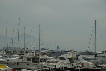View of Mount Vesuvius and the boats in the port of Naples
