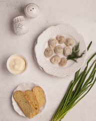 Hand-made dumplings. Cooking dumplings. Cooked dumplings with herbs and vegetables