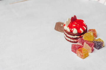 Red cake sweets delight dessert in plates wooden background