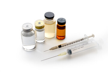 corona virus vaccine vial and injection syringe protection concept
