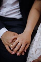 bride and groom holding hands