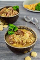 Porcini mushroom soup with potato and pearl barley.