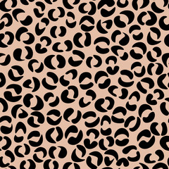 Abstract modern leopard seamless pattern. Animals trendy background. Beige and black decorative vector stock illustration for print, card, postcard, fabric, textile. Modern ornament of stylized skin.