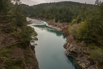 Clean and transparent water of Smith River, which flows from the Klamath Mountains to the Pacific Ocean