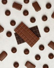 Chocolate and chocolate candy. Different chocolates and candies for coffee and tea.