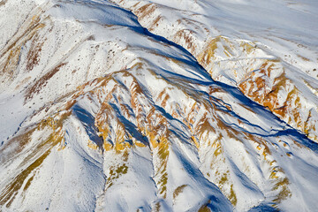 Aerial view of Mars-1 (red, orange, yellow mountains) in winter. Altai Republic, Siberia, Russia.