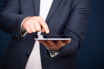 Businessman using tablet, double exposure with network