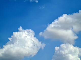 Naklejka na ściany i meble Bright blue sky and clouds