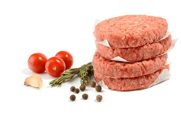 Raw beef patties for making a burger.Isolated on a white background.Selective Focus.