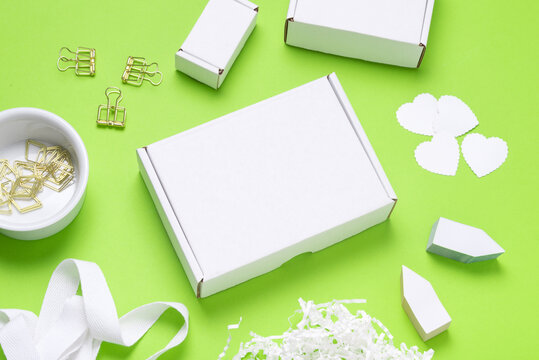 White Cardboard box on color office desk