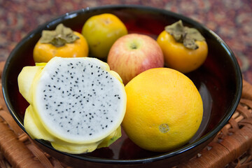 Close up view of a sliced yellow Dragon fruit (Pitaya), in a fruit bowl