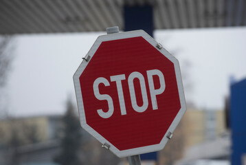 red stop sign in traffic