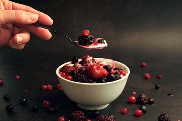 natural yogurt and red berries